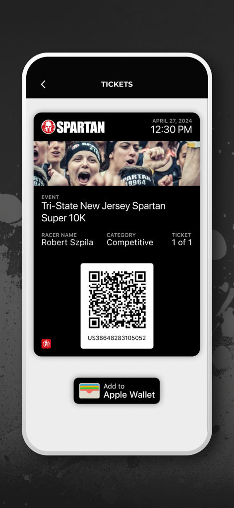 A mobile app screen displaying a Spartan Race digital ticket with a QR code and event details
