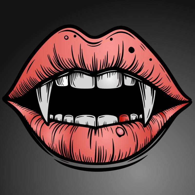 lips with vampire teeth