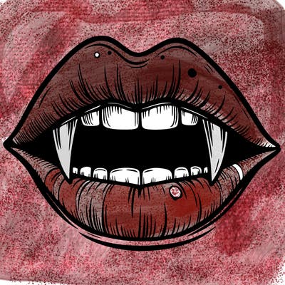 lips with vampire teeth