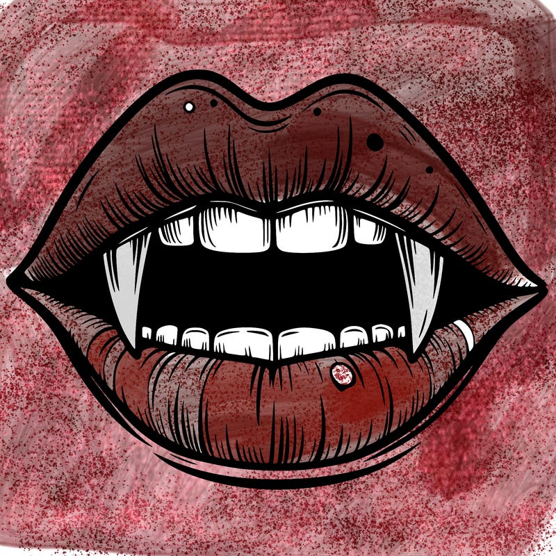 lips with vampire teeth