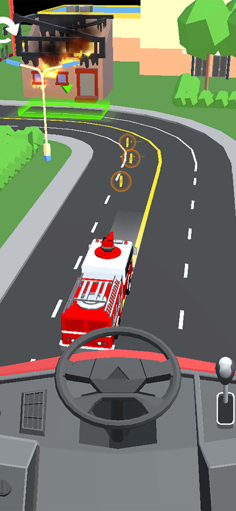 First person view from inside a fire truck driving towards a burning building on a road with coins in Car Drive 3D