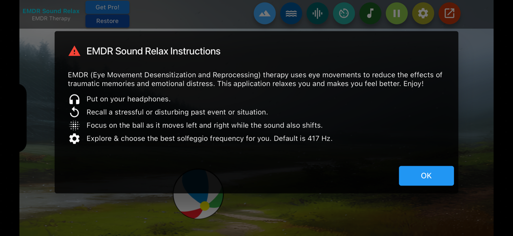 An instructional overlay in the EMDR Sound Relax app explaining how to perform EMDR therapy using headphones and solfeggio frequencies