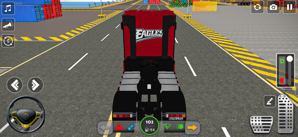 Cargo Truck Games Simulator 3D - Rear view of a red semi truck in a 3D driving simulator showing the steering wheel and pedals on the interface