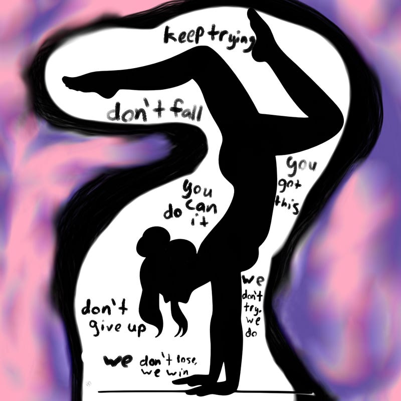 a woman doing a handstand