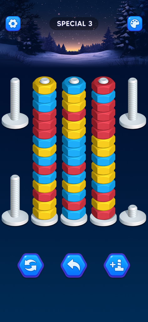 Colorful nuts stacked on bolts in Nut Sort puzzle game with a winter landscape background