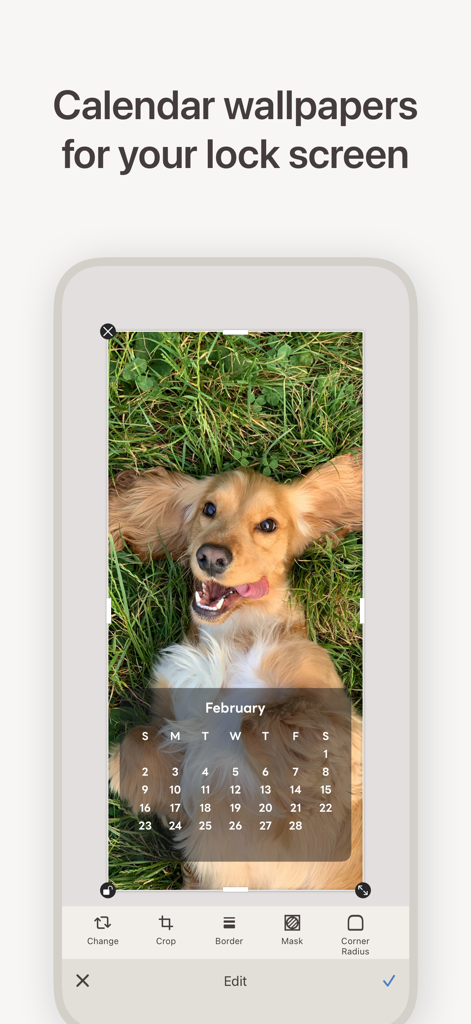 スマートフォンで犬の写真を2月のカレンダーロック画面の壁紙に編集するユーザー