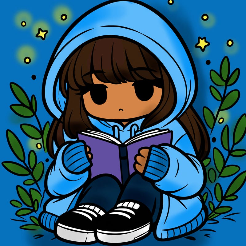girl in oversized hoodie reading a book