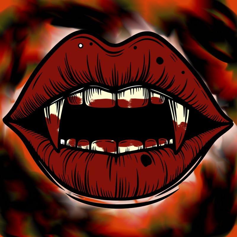 lips with vampire teeth