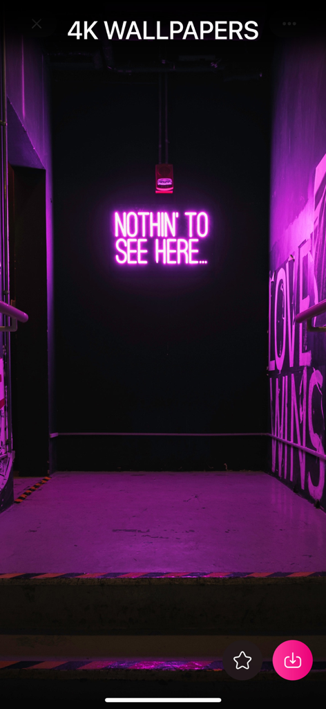 VIBE 4K Wallpapers Cool Screen - A pink neon sign reading NOTHIN TO SEE HERE in a dark hallway used as a 4K smartphone wallpaper.