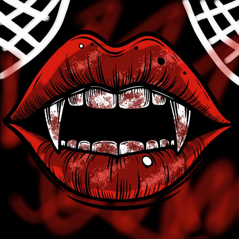 lips with vampire teeth