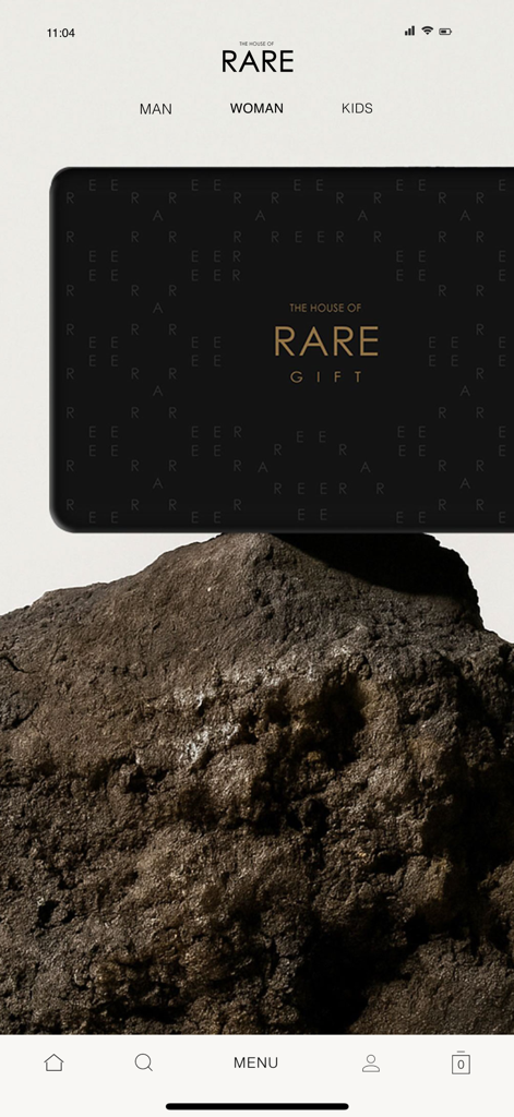 HOUSE OF RARE - The House of Rare mobile app interface showing a premium black and gold gift card resting on a dark rock with categories for Man Woman and Kids.
