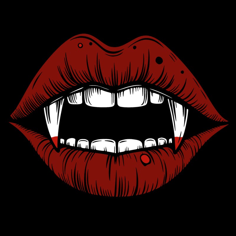 lips with vampire teeth