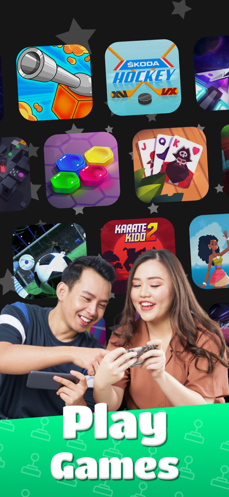 A man and a woman smiling while playing mobile arcade games on their smartphones.