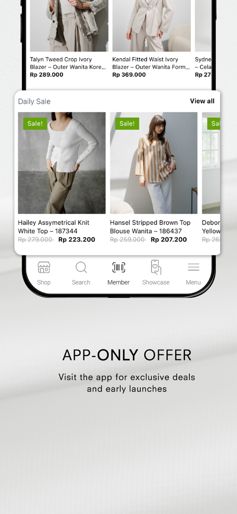 The This Is April mobile app interface showing a daily sale section with minimalist women's clothing and an app-only offer banner.