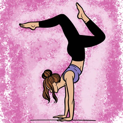 a woman doing a handstand