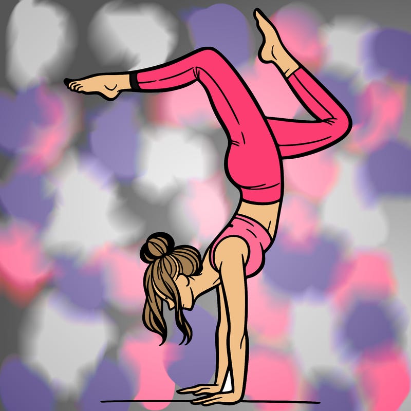a woman doing a handstand