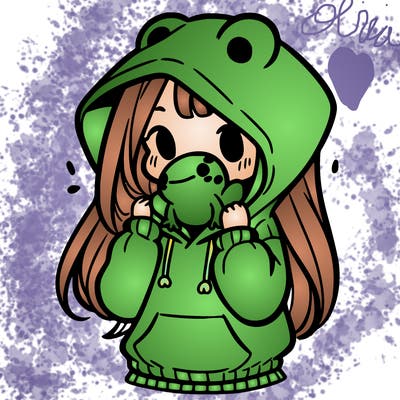 a girl holding a froggy hoodie