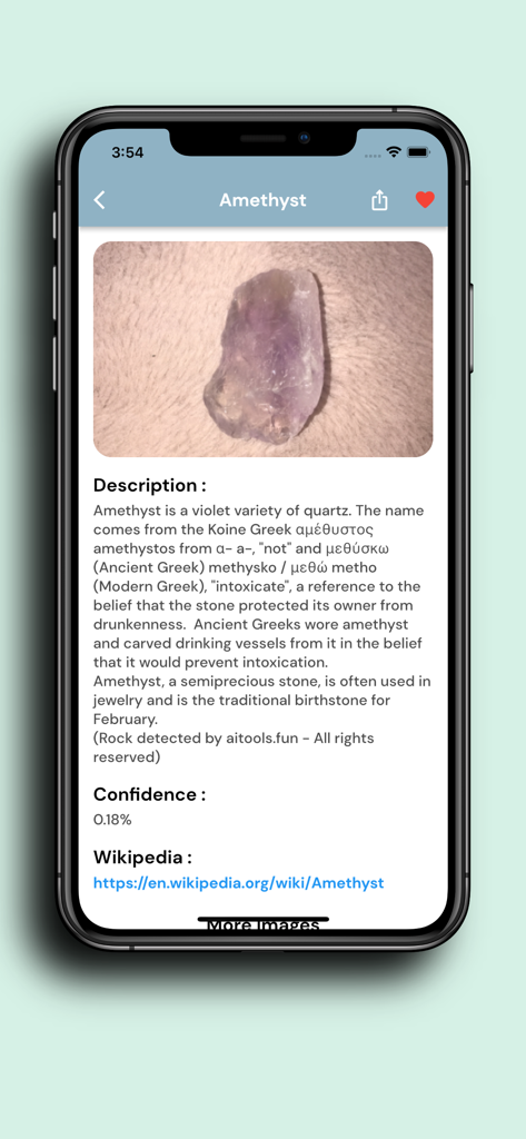 Stone Identifier : Rock finder - A screenshot of the Stone Identifier app showing a photo and detailed description of an amethyst rock.