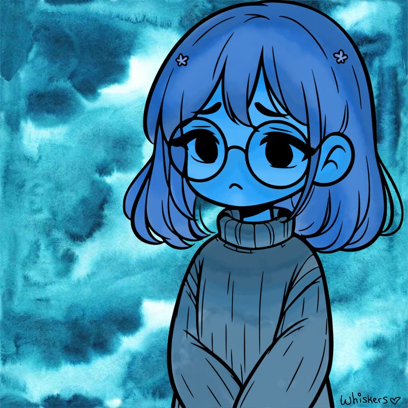 sad girl with glasses in a sweater