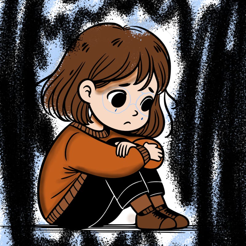 a girl sitting sad