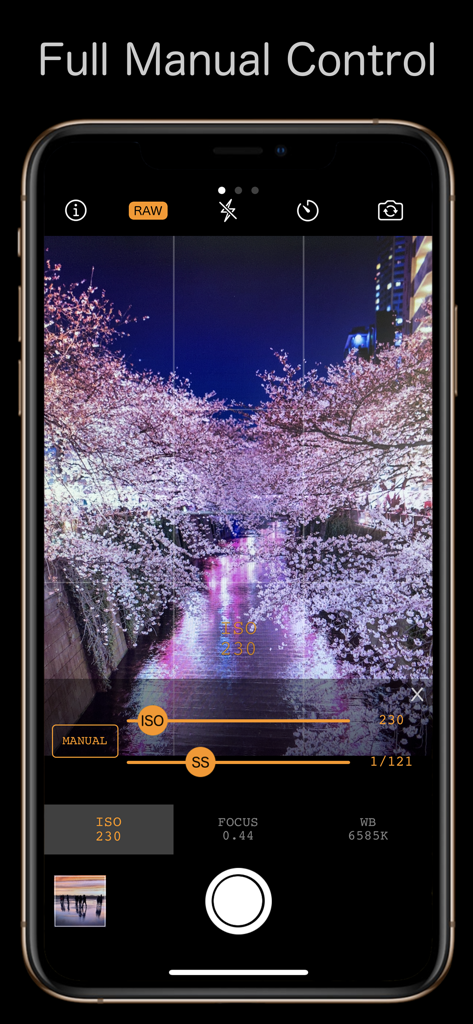 Smartphone screen showing the Simple RAW Camera interface with manual ISO and shutter speed sliders over a night photo of cherry blossoms.