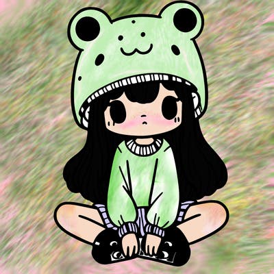 a girl wearing a frog hat and some frog socks