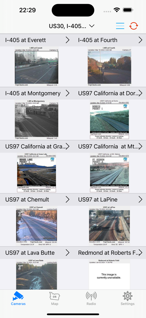 A 2-column grid view of multiple live traffic camera feeds along I-405 and US-97 in Oregon within the app interface