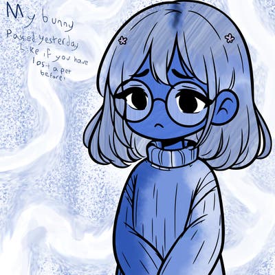 sad girl with glasses in a sweater