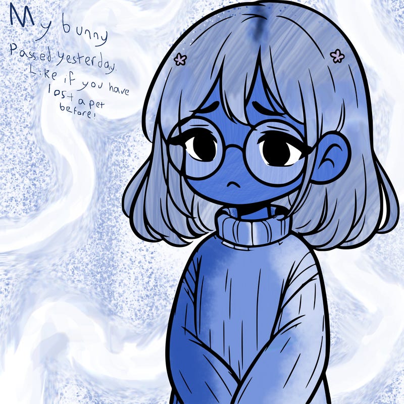 sad girl with glasses in a sweater