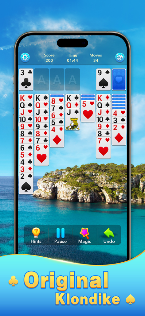 Solitaire Klondike! - A screenshot of the Solitaire Klondike game featuring a classic card layout over a scenic coastal background with blue water and cliffs.