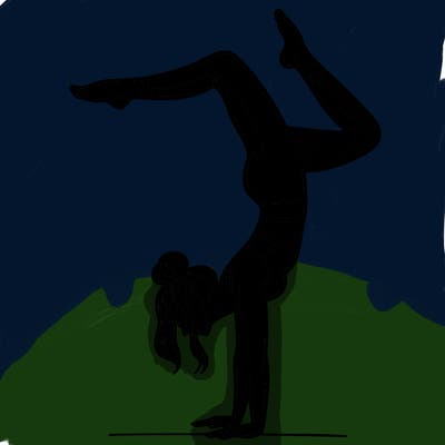 a woman doing a handstand