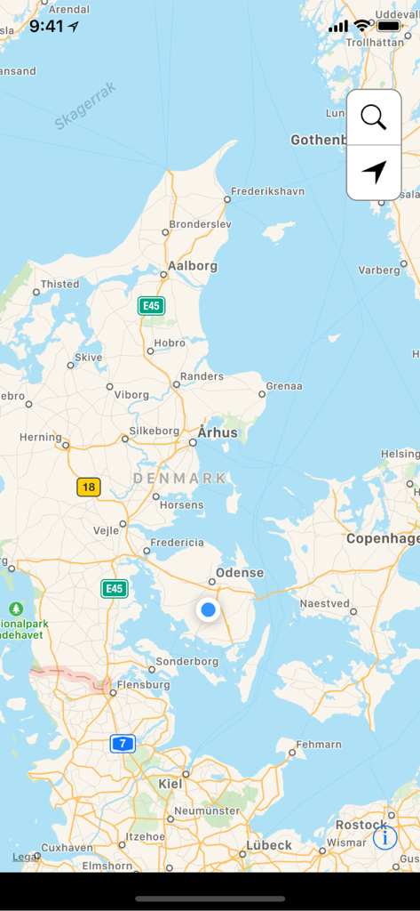 Captura de pantalla de la aplicación MHz mostrando un mapa de Dinamarca con un marcador de ubicación GPS para la coordinación de frecuencias.