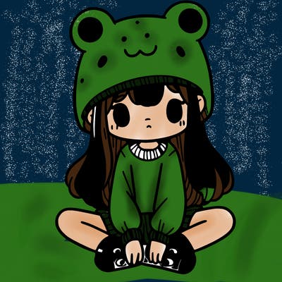a girl wearing a frog hat and some frog socks