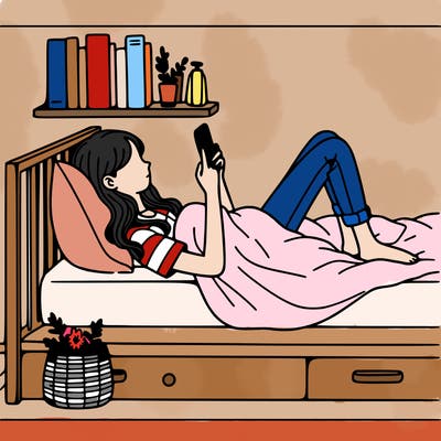 a girl laying on her bed with her phone