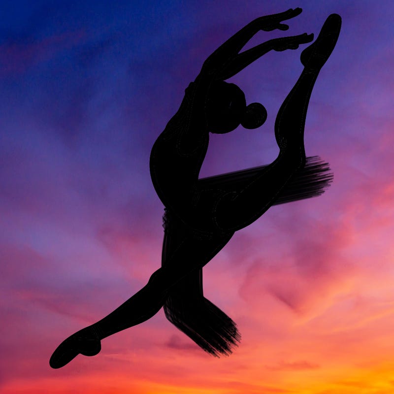 gymnast doing a leap in a leotard with a bent back leg