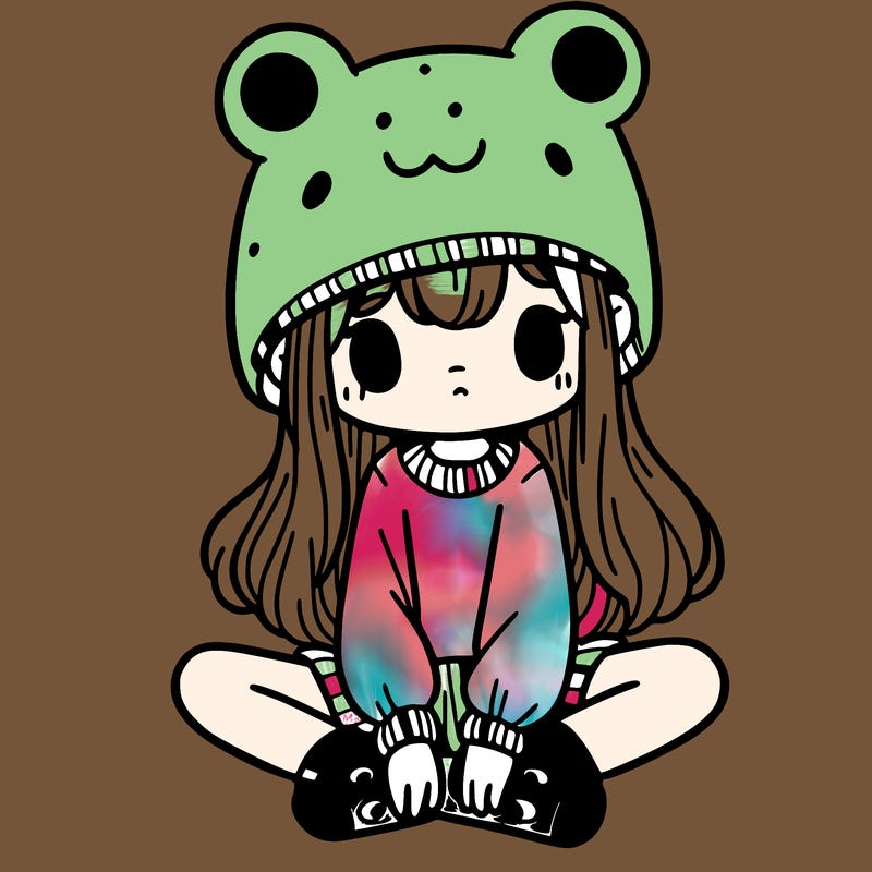 a girl wearing a frog hat and some frog socks