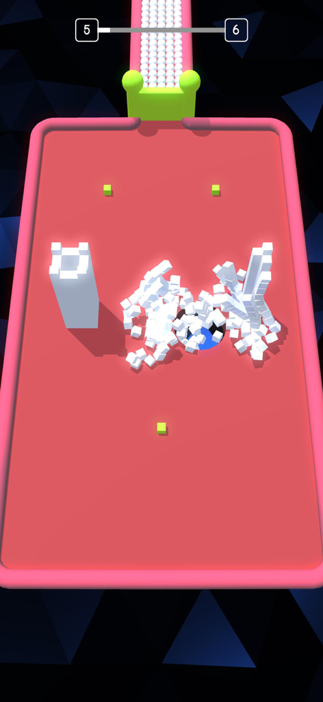 Jugabilidad 3D de Color Hole tragando bloques blancos en una plataforma rosa