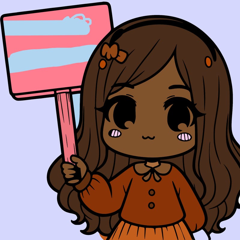 a girl holding a sign