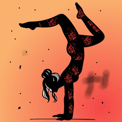 a woman doing a handstand