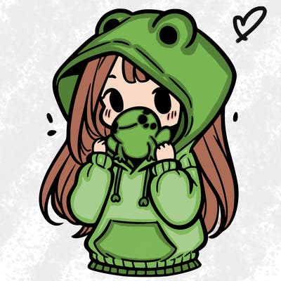 a girl holding a froggy hoodie
