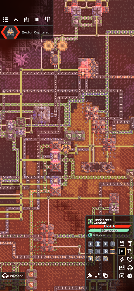 Mindustry - Top down view of a complex industrial automation factory layout with conveyor belts and resource management blocks in Mindustry