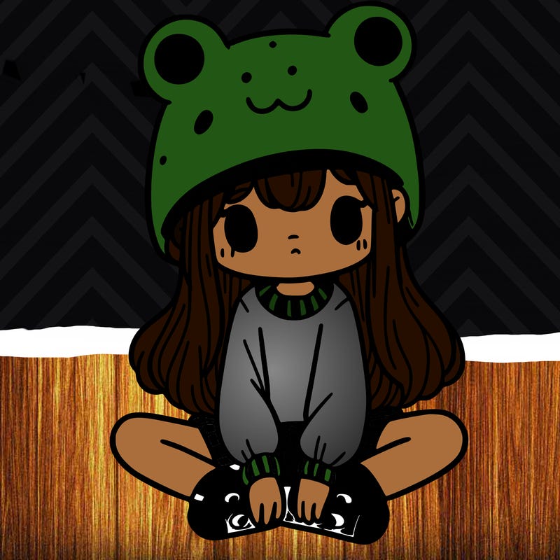 a girl wearing a frog hat and some frog socks