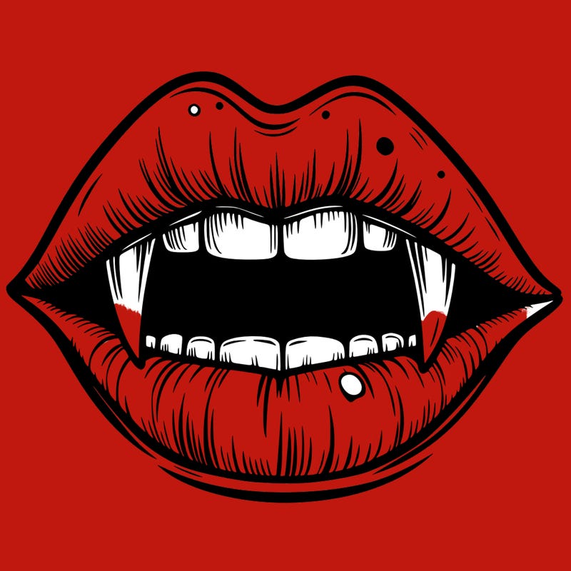 lips with vampire teeth