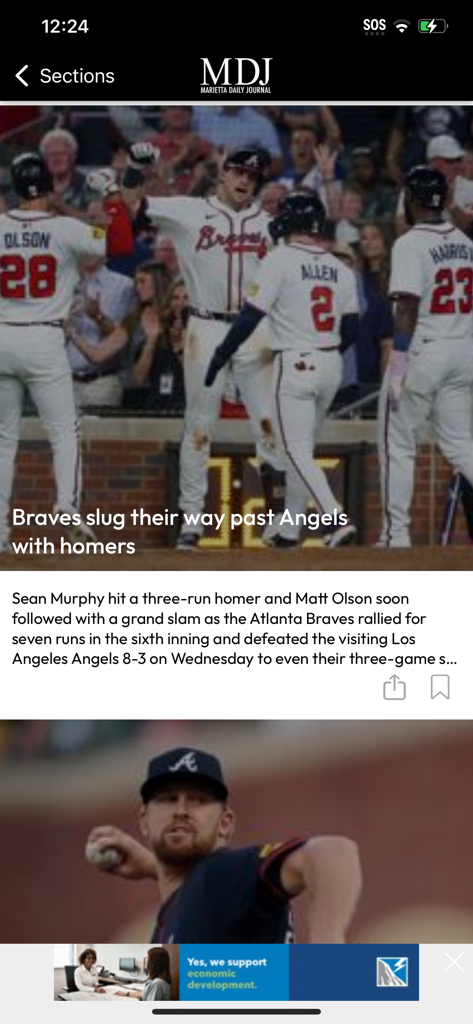 Marietta Daily Journal - The Marietta Daily Journal app displaying a sports news article about the Atlanta Braves
