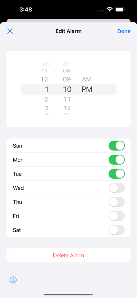 Interface for editing a vibration alarm with time selection and daily repeat toggles.