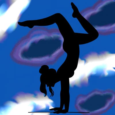 a woman doing a handstand