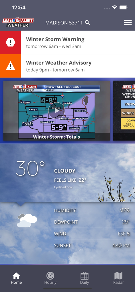 WMTV15 First Alert Weather app screen showing winter storm warnings and local snowfall forecast for Madison.