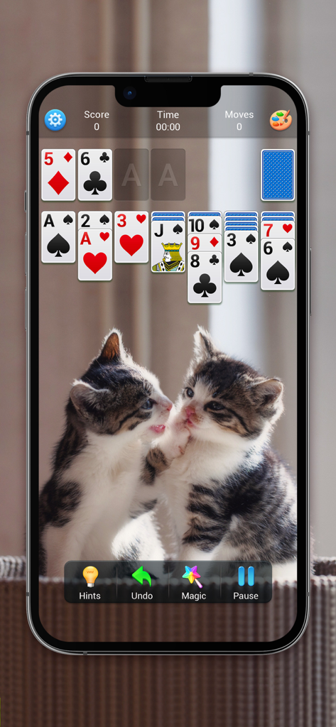 Solitaire, Klondike Card Games - A classic Klondike solitaire card game interface with a background featuring two fluffy kittens