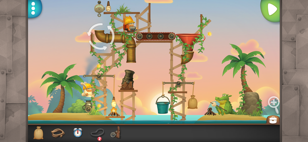 Inventioneers - Inventioneers gameplay showing a physics machine level set on a tropical island