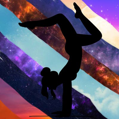 a woman doing a handstand